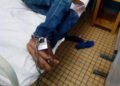 UN MILITANT DU MRC ENCHAINE SUR SON LIT D’HOPITAL